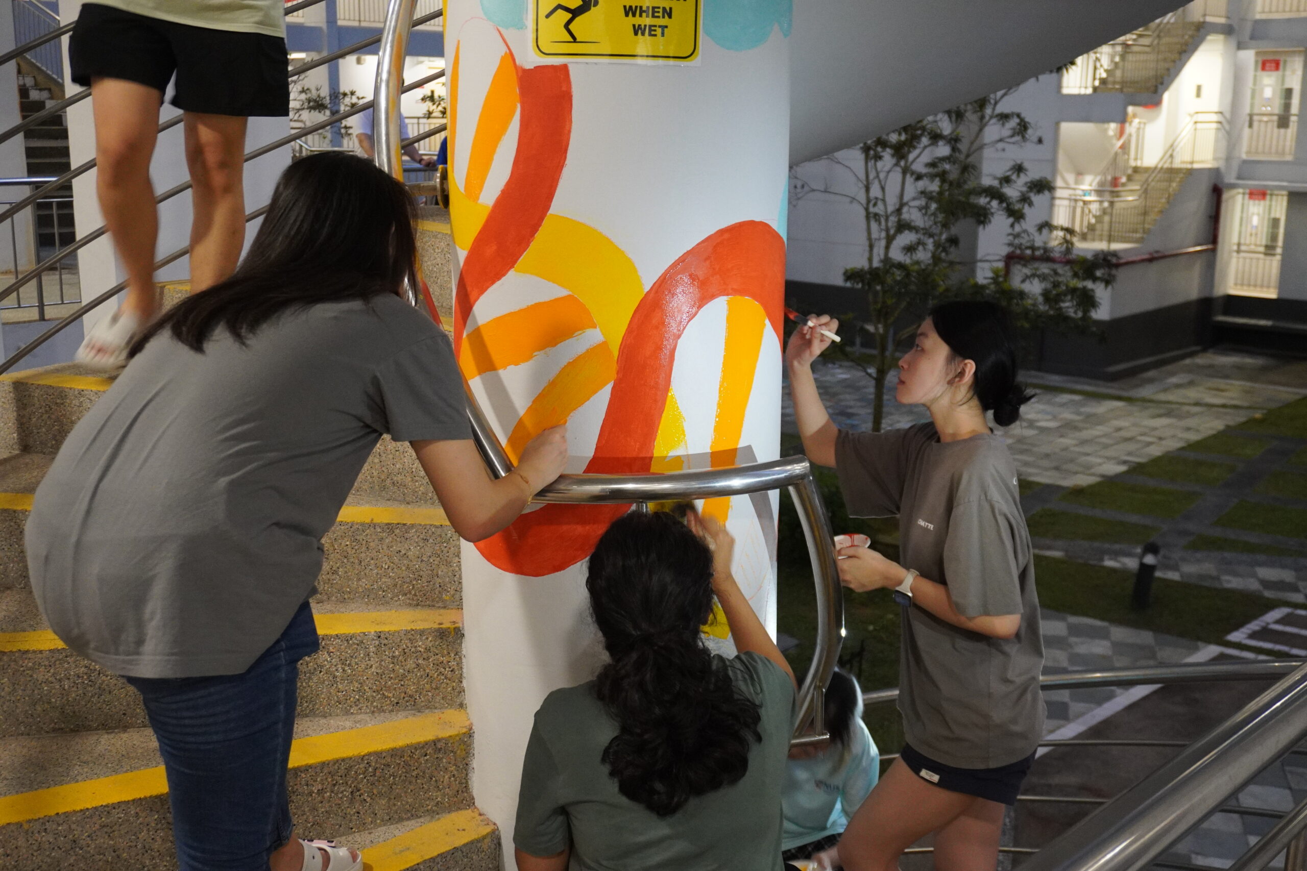 Helixians working together to create a wonderful mural art