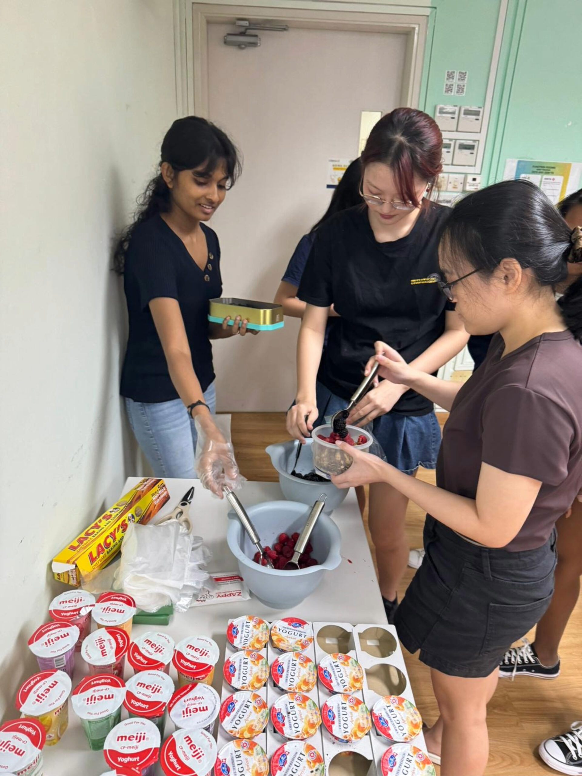 Helixians enjoying their granola with fruits and yogurt