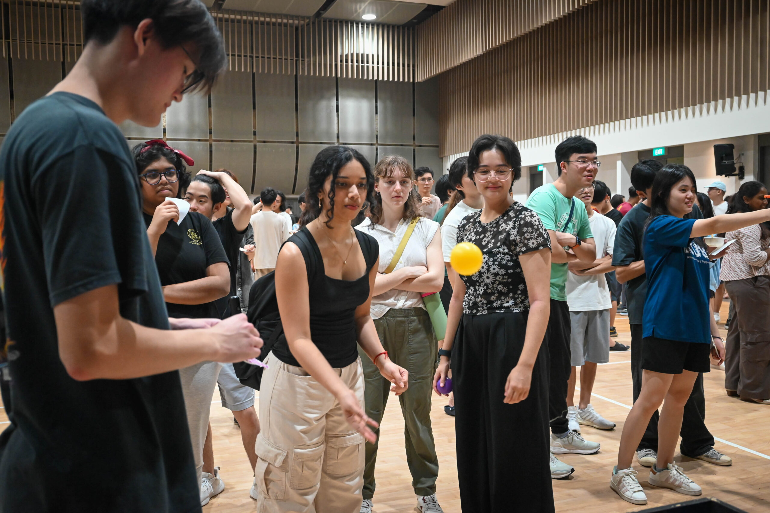 Helixians engaging in the various game booths