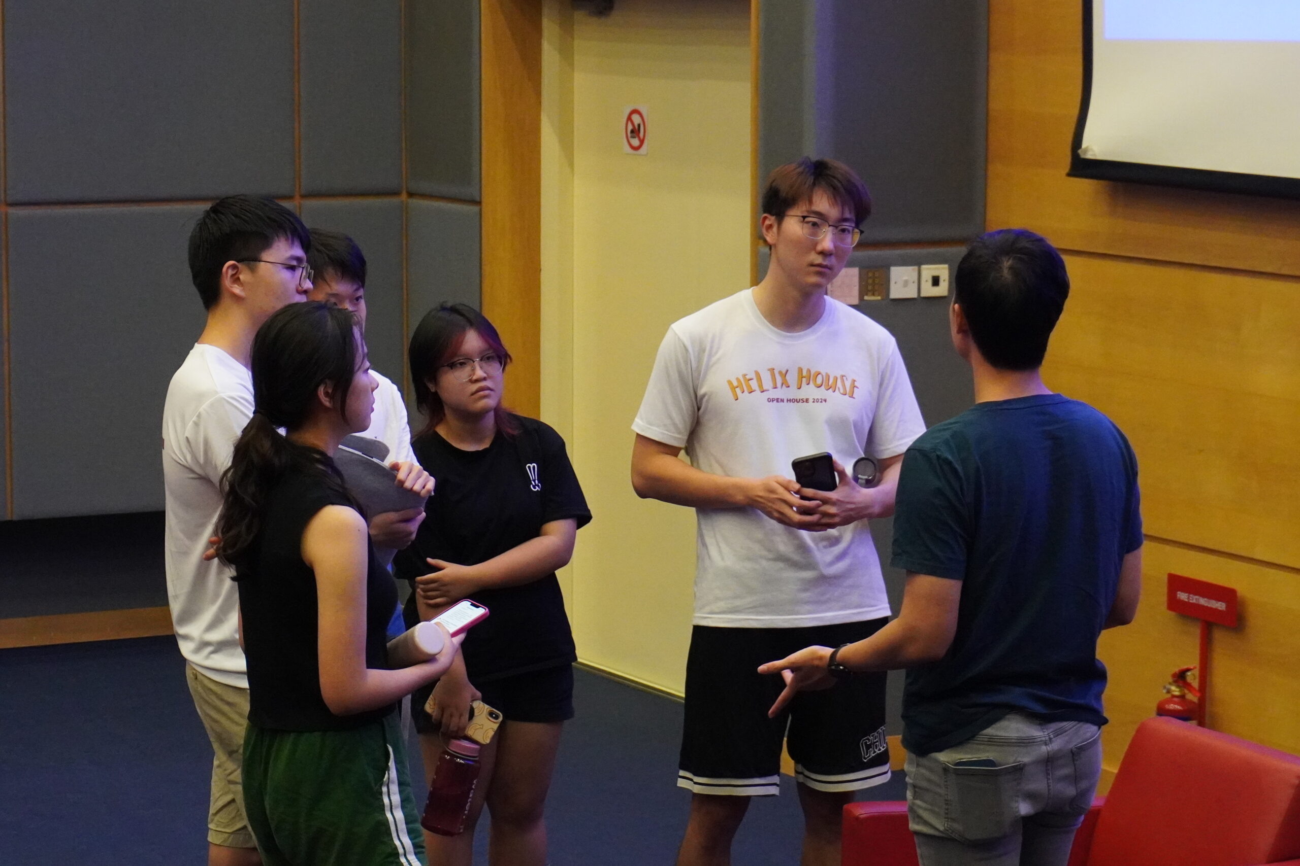 Helixians engaging Owen after the session