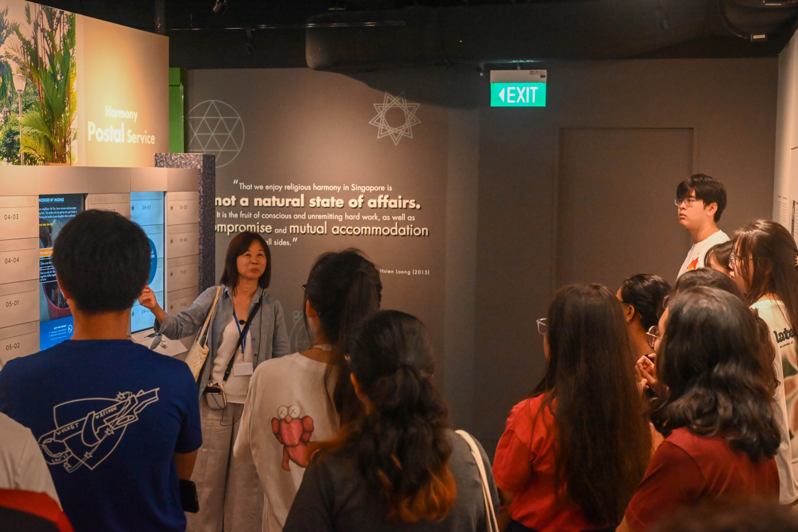 Ms Regina sharing about the various religions with Helixians